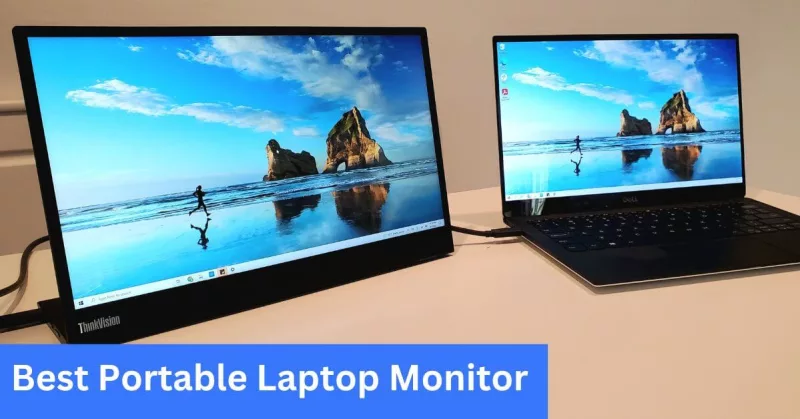 laptop and monitor on a brown table